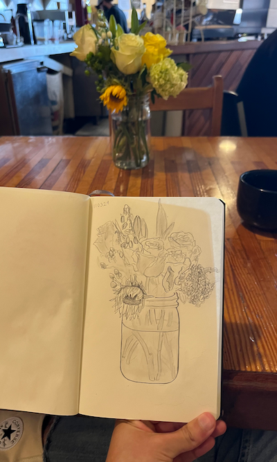 Morning sketch of fresh flowers at Milagro Coffee