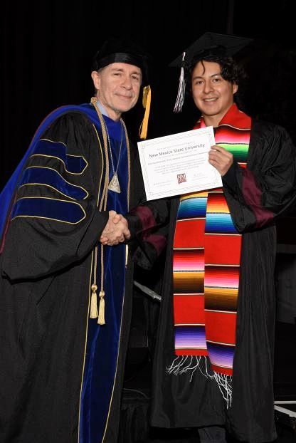 Receiving my certificate from the dean